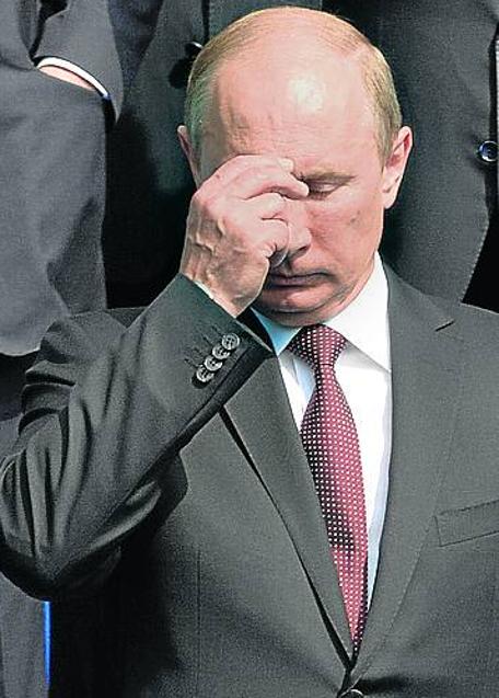 Putin, en una celebración religiosa en Kiev en el año 2013. /AFP