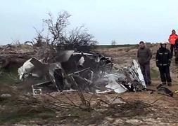 Restos de la avioneta que se ha estrellado en El Álamo./ Efe | Atlas/