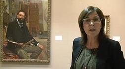 La responsable del museo, Sara González de Aspuru, ante un autorretrato de Fernando de Amárica/