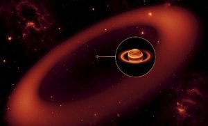 Recreación del anillo recién descubierto, que rodea Saturno a mucha más distancia que el resto. / NASA/