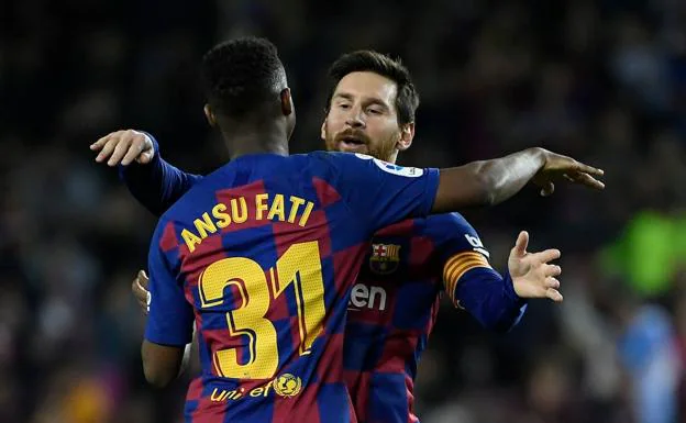 Ansu Fati and Messi celebrate a goal. 